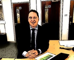 Sales director sitting at his desk